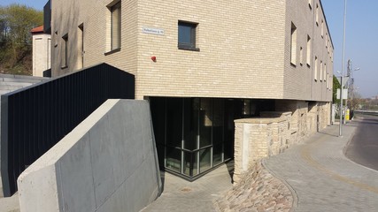 Narrow street and new building in the old town
