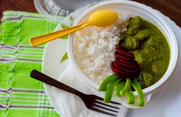 Indian healthy meal spinach with soyachunks and rice with beautifully decorated salad