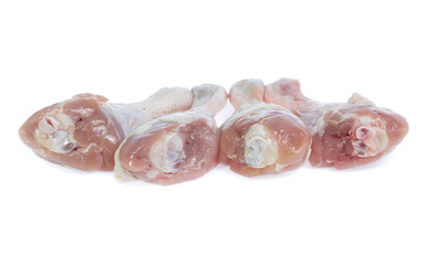 Raw chicken  on cutting board on white background