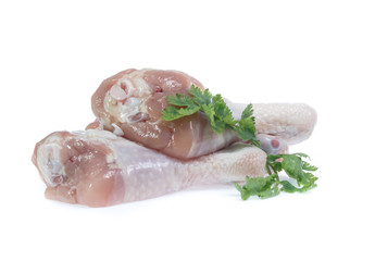 Raw chicken  on cutting board on white background