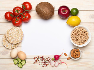 Diet food concept, healthy vegan eating. Frame of fresh vegetables and fruits, copy space