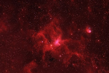 Red galaxy in deep space. Elements of this image were furnished by NASA.