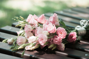 the bride's bouquet of pink roses