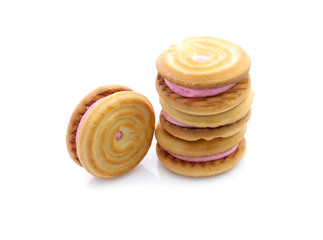 Fototapeta premium sandwich cookies with strawberry cream on white background