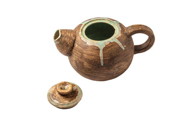Handmade clay teapot Isolated on a white background. Antique pottery