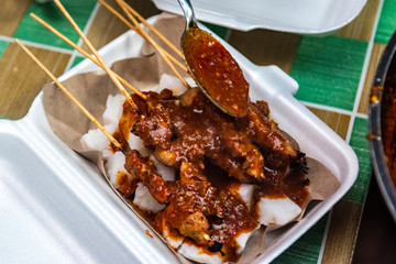 Grilled chicken skewers or satay with peanut sauce