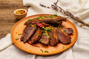 Roasted duck breasts, spices and Demi-glace sauce. Traditional French food