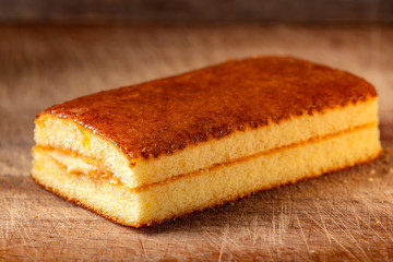 Sponge cake filled with fruits and vanilla cream