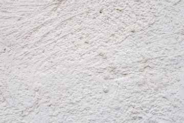 abstract background of an old painted white wall close up