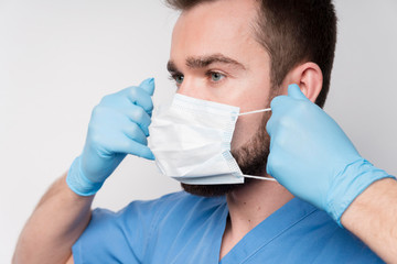 Close-up nurse wearing surgical mask