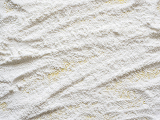 Baking background with flour, top view, close up