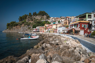 the city of Parga, by the mediterranean sea, with it's houses and boats in the pier