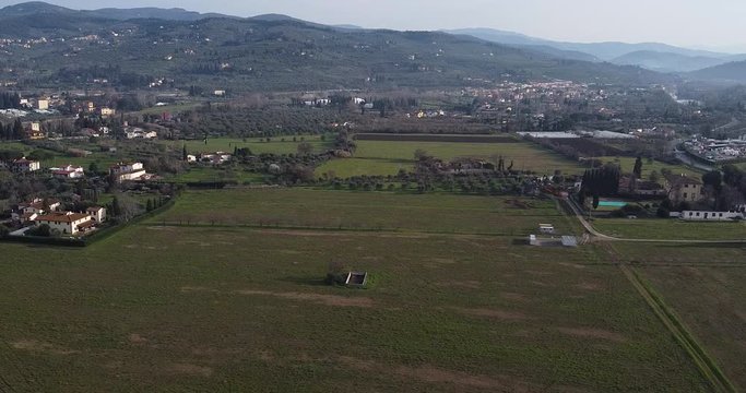 Scrolling Aerial shot of new ACF Fiorentina soccer sport center area. Countryside field on Tuscany hills around Florence bought by president Commisso. Bagno a Ripoli, South Florence. Europe Italy
