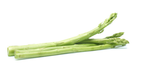 Fresh green asparagus on white
