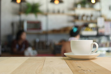 Hot Coffee cup  on the wooden table