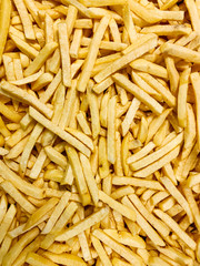 lots of potato for cooking fries for food as a background