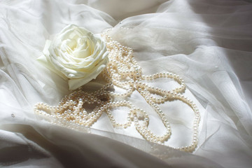 white wedding dress with pearls