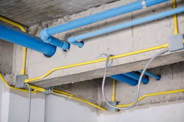 Water pipe systems, piping and electrical wiring in buildings under construction