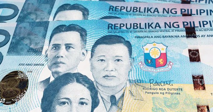 Panorama slide footage over 1000 Philippine peso. 4k detailed 3d macro capture of 1000 pesos. Macro photography footage of a fan with the front side of a Philippines  banknote. Legal tender. 