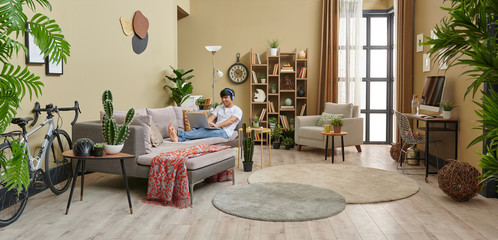 Man at home and corona virus warning interior decoration.