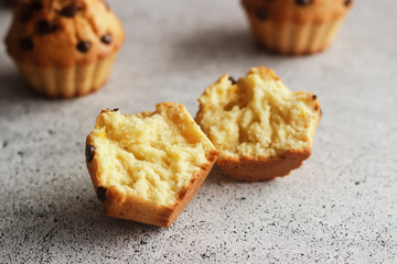 Delicious orange muffins with chocolate. Muffins on the table