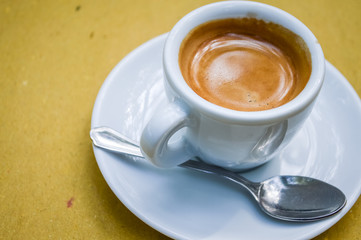 espresso coffee in a white cup close up