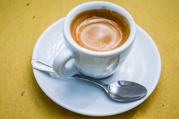 espresso coffee in a white cup close up