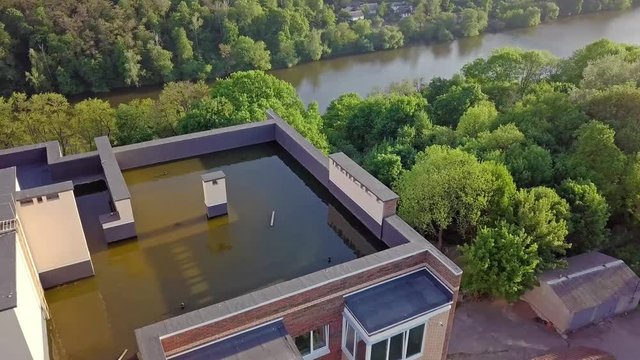 Aerial view of roof checking with plenty of water