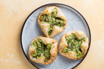 
 Homemade spinach  puffs with feta  onion and chicken