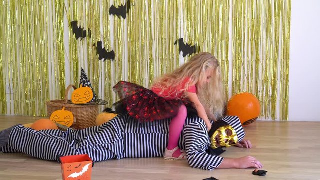 Naughty girl ride and choking her dad with prisoner costume and scary mask