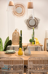 Beautiful wood dinner room with plants and colorful decoration