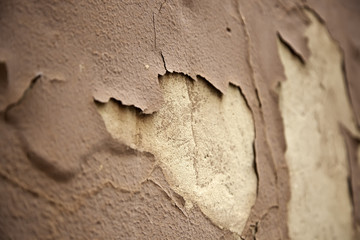 Peeling painted wall
