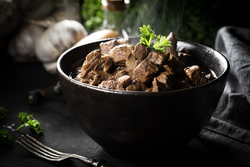 Beef stew in a bowl.