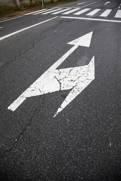 Direction arrows on the asphalt