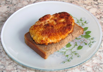   Patty with a piece of bread