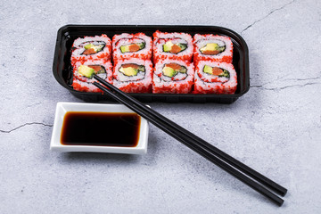 Sushi roll sushi with prawn, avocado, cream cheese, sesame. Sushi menu. Japanese food.