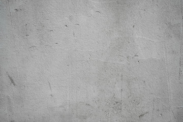 Gray concrete background. Concrete pavement texture. Place for text on a gray background.