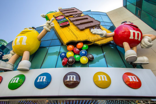 Las Vegas, Nevada, USA - Exterior of the M & M world store with candy wrapper and mascot. M & M's are part of the  Mars Candy Company. 