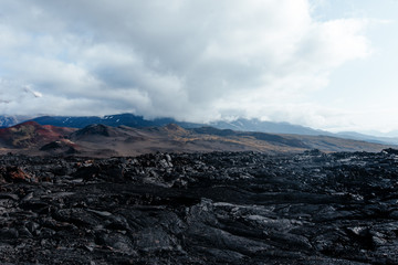 Volcano Tolbachik and frozen lava fields
