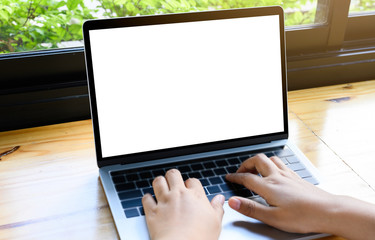 Computer mockup white background on desk. Laptop with blank screen.