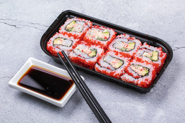 Sushi roll sushi with prawn, avocado, cream cheese, sesame. Sushi menu. Japanese food.