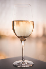wedding rings in a glass of champagne
