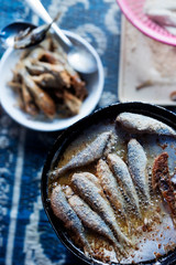 Frying small sardines fish, Chefchouen, Morocco