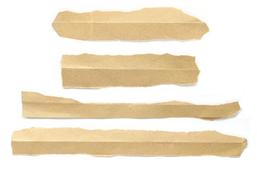 Recycled paper craft stick on a white background. Brown paper torn or ripped pieces of paper isolated on white background.	