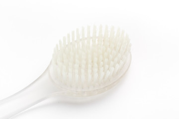 Shower brush on a white background