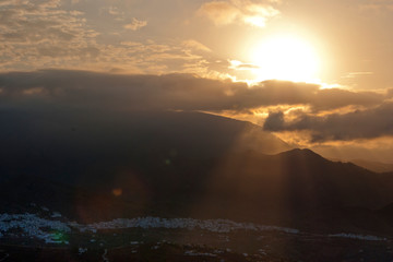 Sun rising over the Town of  Frigiliana, Malaga Province, Axarquia, Andalusia, southern Spain.