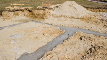 Foundations for the small house under construction
