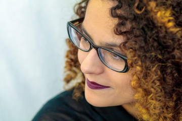 young afro american woman with glasses, narrow focus