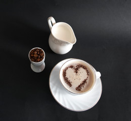 cup of coffee with coffee beans