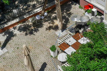 Thessaloniki, Greece Empty outdoors tables as Coronavirus measures affect business & life. Greek...